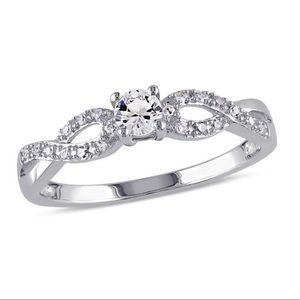 White sapphire and diamond ring